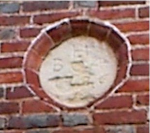 The initials of the owners, Benjamin Harrison IV and his wife, Anne, appear in a datestone over a side door. 